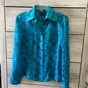 Size 6 INC women’s preowned silk blouse.